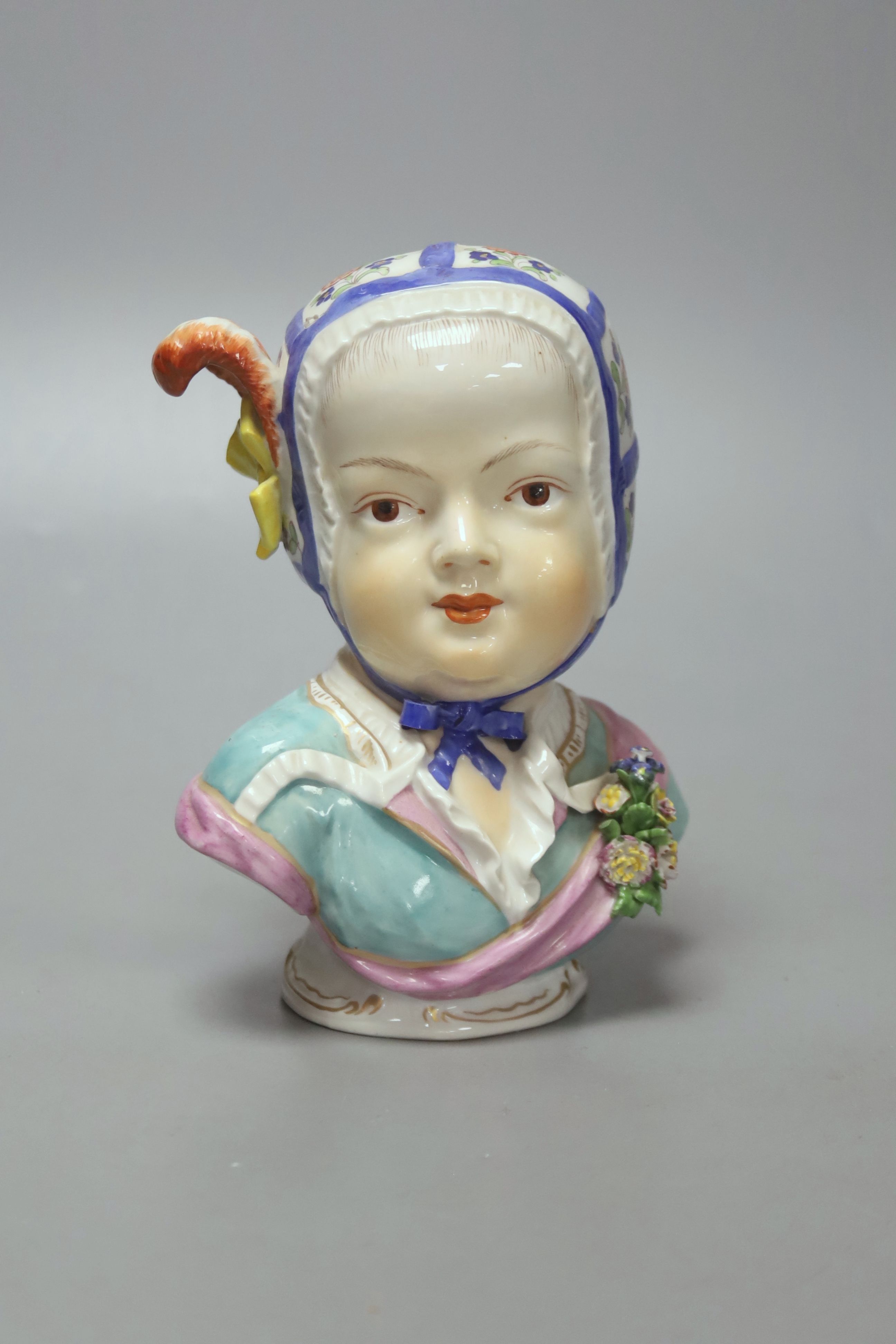 After J.J. Kandler. A Dresden porcelain bust of a child, 14.5cm high